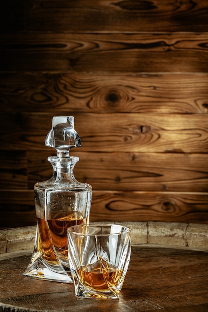 A bottle of cognac and glass. Brandy