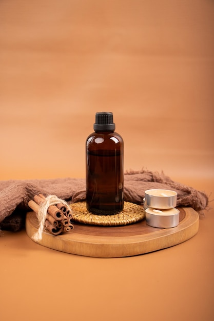 Photo a bottle of cosmetic sits on a round tray with a bottle of wine