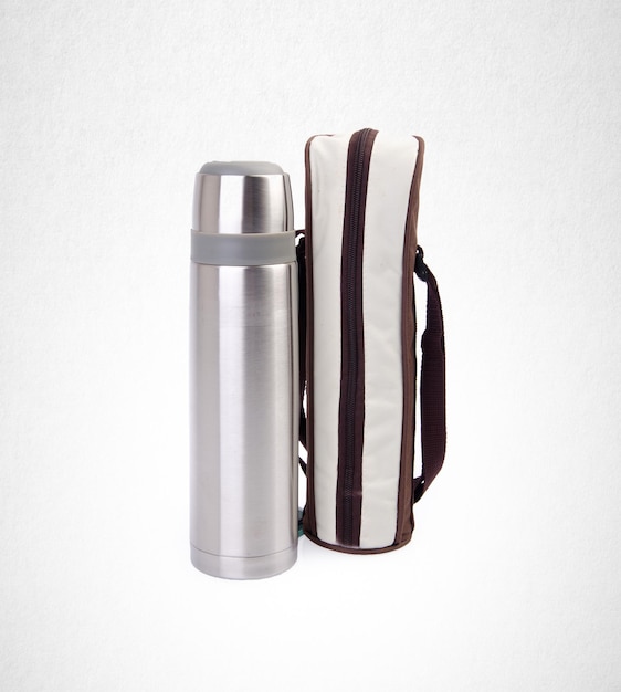 Photo bottle and cover over white background