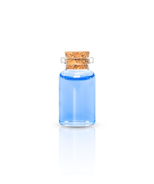 Bottle of essential blue oil isolated on white background