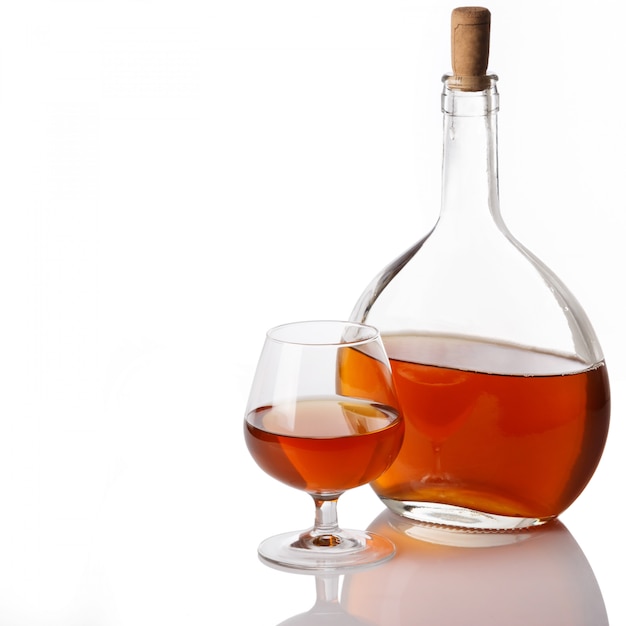 Bottle and glass with cognac