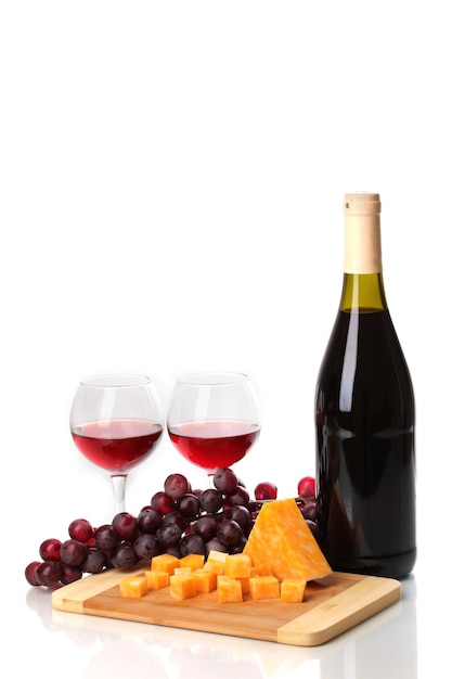 Bottle of great wine with wineglasses and cheese isolated on white