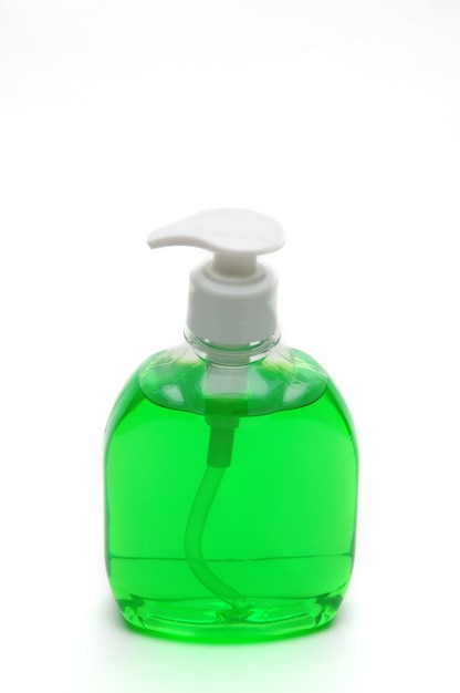 Bottle of green liquid soap isolated on white