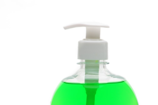 bottle of green liquid soap isolated on white