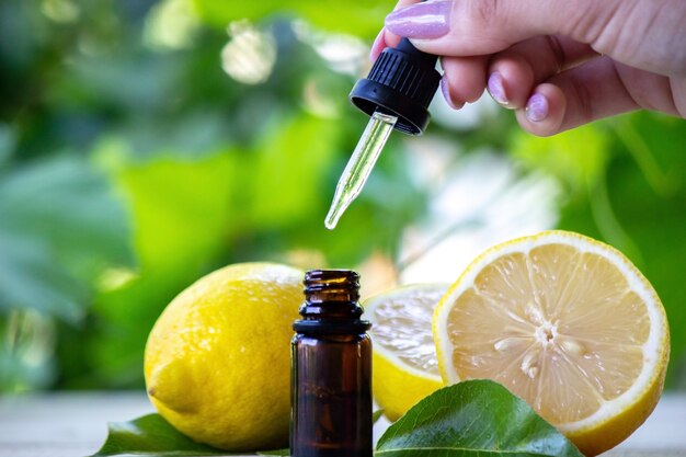 A bottle of lemon essential oil is an alternative medicine.