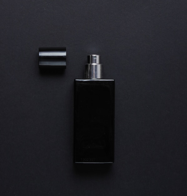 Bottle of male perfume. Top view