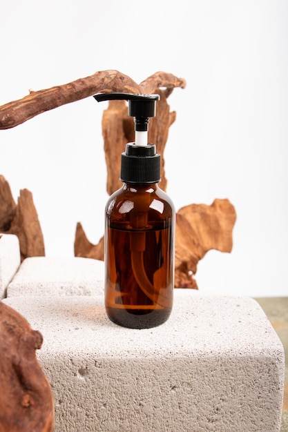 a bottle of natural perfume by person