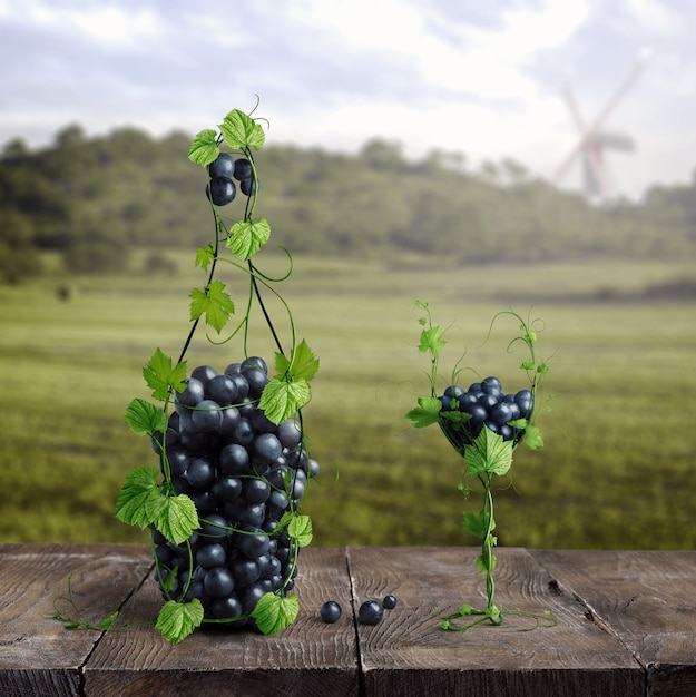 Una bottiglia e un bicchiere di vino d'uva