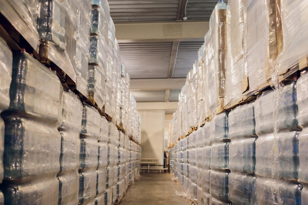 Bottle plastic on pallets are storage in the warehouse and factoryMaterial plastic storage on floor and racking