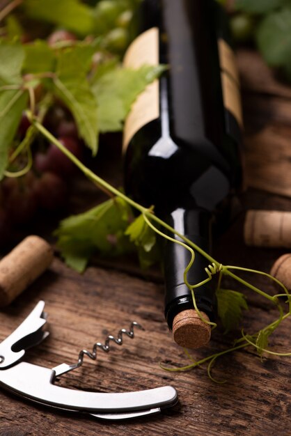 Bottle of red wine on wooden table