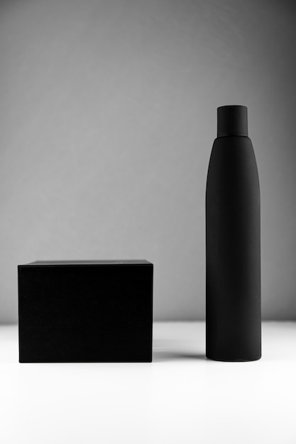 Bottle for shampoo and a black box