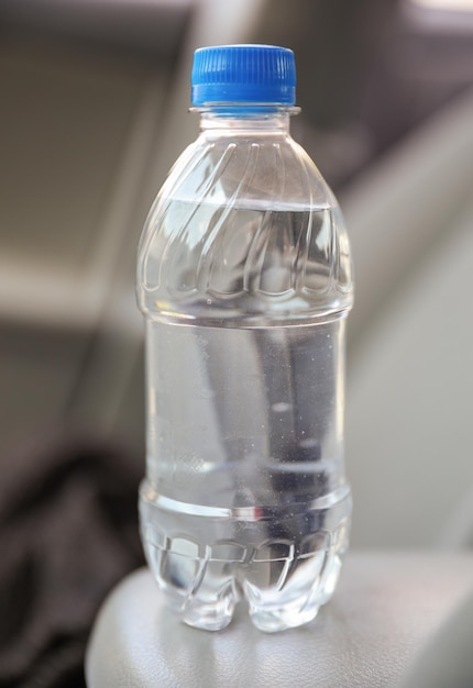 A bottle of water with the word " water " on it