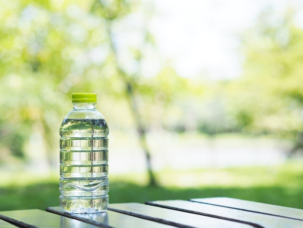 Bottle of water on wooden table