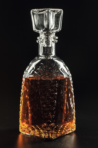 Bottle of whiskey, or rum, or alcohol stands