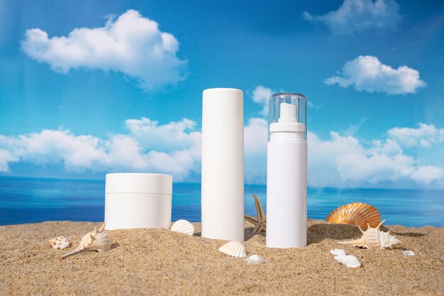 A bottle of white beauty products on a beach