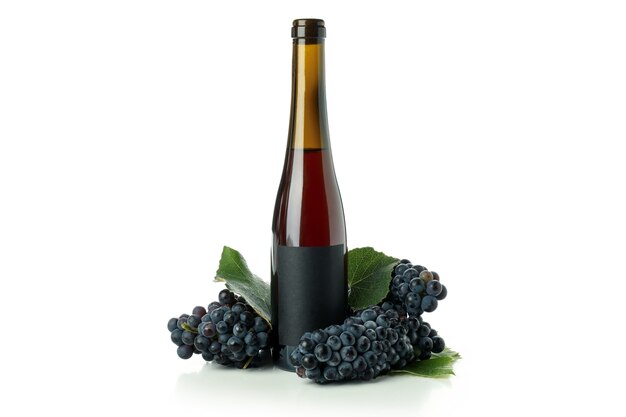 Bottle of wine and grape isolated on white background