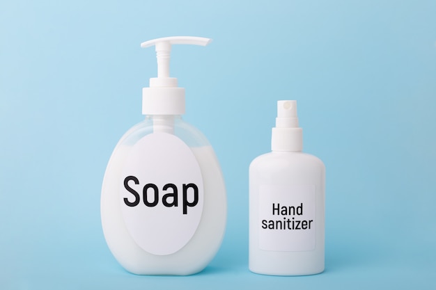 bottle with soap and hand sanitizer in studio. things to keep hands clean. concept of hygiene