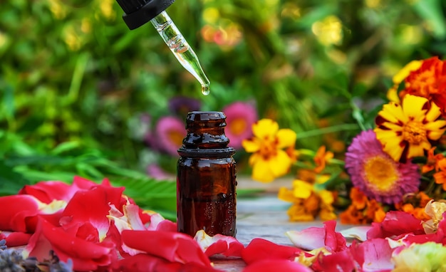 Bottled herbal and flower tinctures. Selective focus.