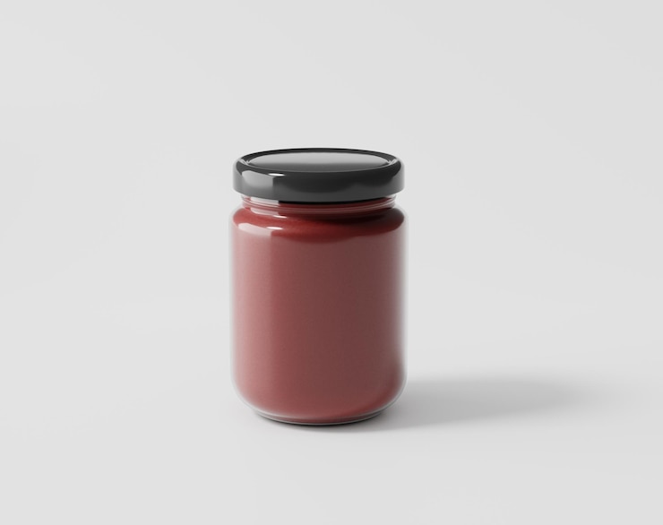 Photo bottled jam on a white background glass bottle with label