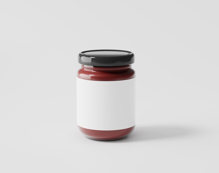Photo bottled jam on a white background glass bottle with label