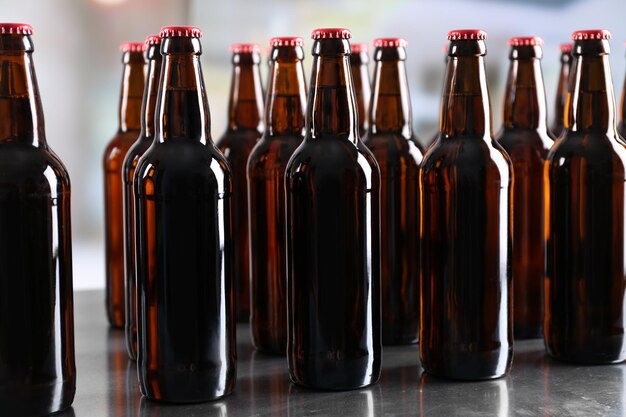 Photo bottles of beer on blurred background