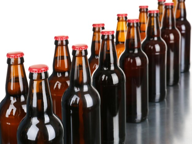 Bottles of beer on white background