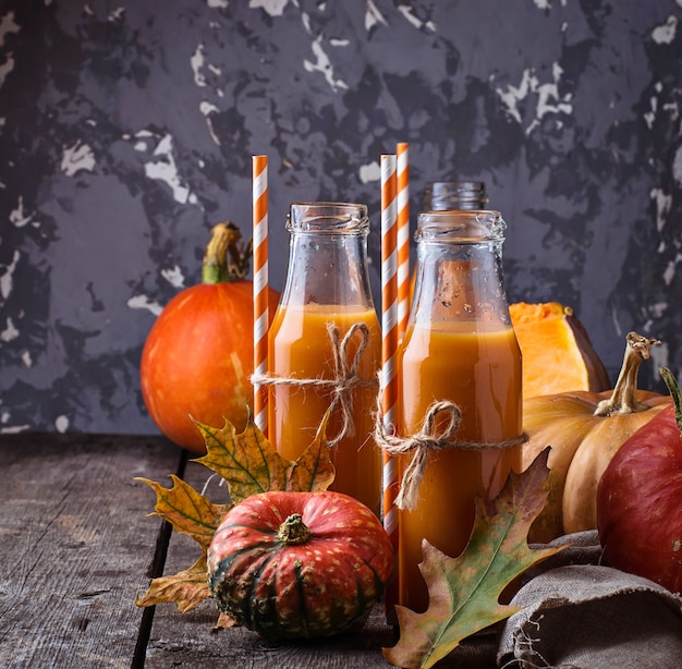 Bottles of healthy pumpkin juice