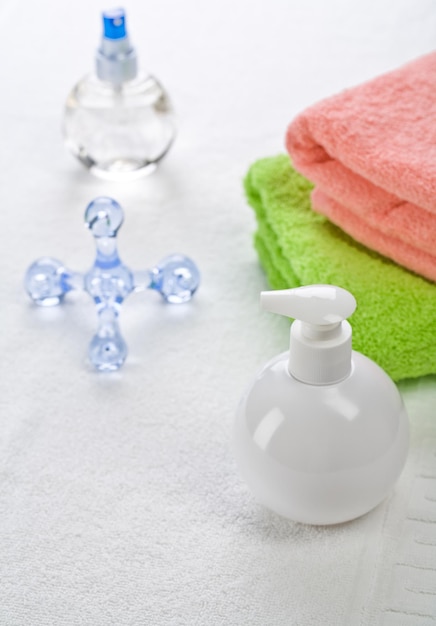 Bottles massager and towels