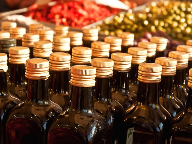 Bottles of olive oil with cap in the market