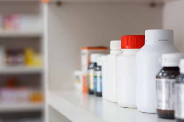 Photo bottles on pharmacy store shelf