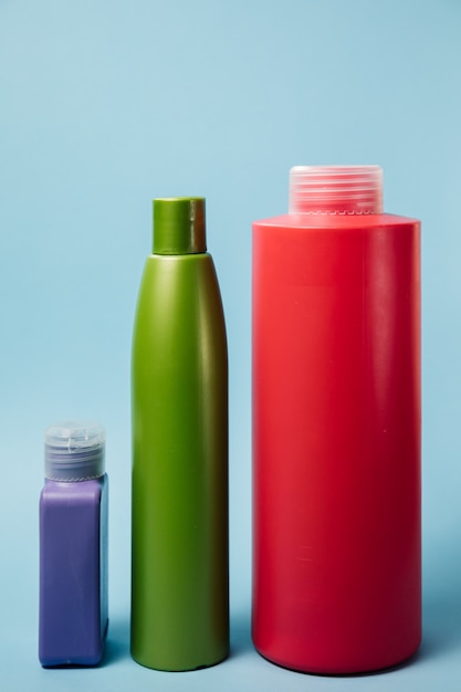 Photo bottles for shampoo on a blue background