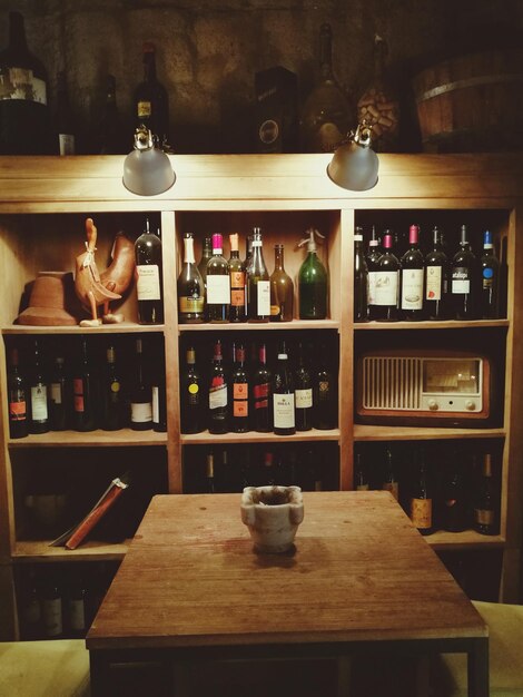 Bottles on shelf in kitchen