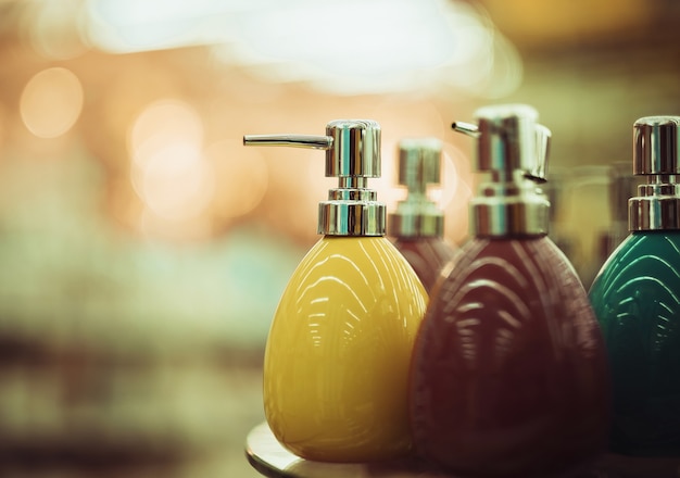 Bottles for soap in the store, soft tones