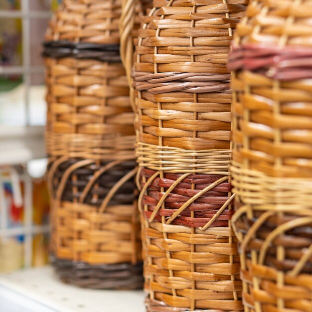 Bottles, wine jugs, jars braided with rattan wood vine