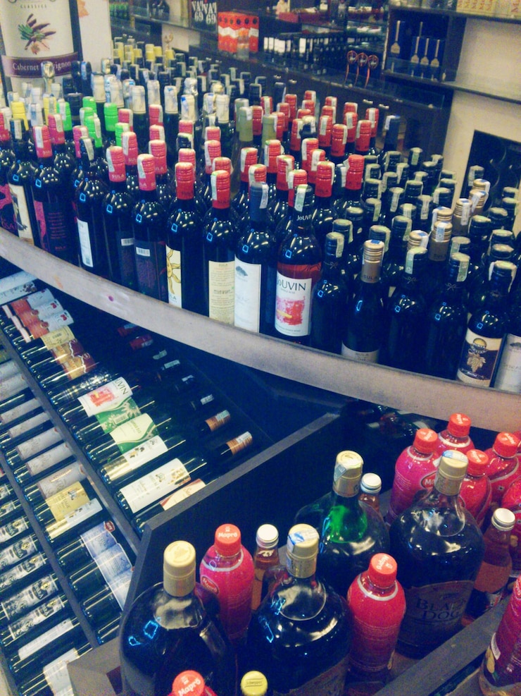 Photo bottles with alcohol in shop
