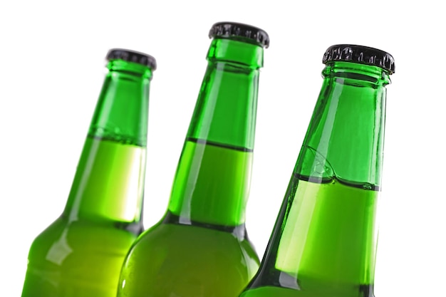 Bottles with fresh beer isolated on white