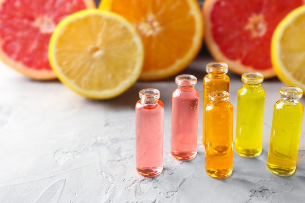 Photo bottles with perfume oil on table