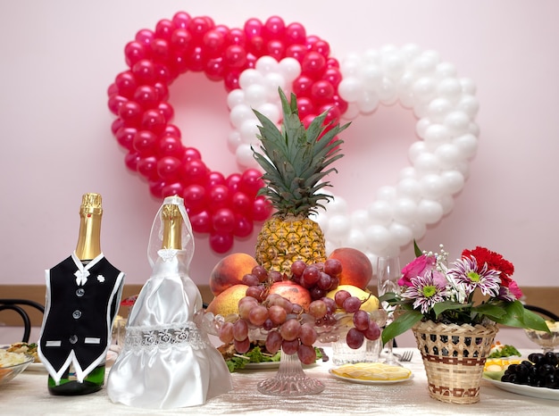 Bottles with wine on a wedding table