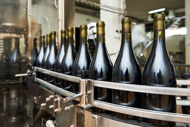 Bottling and sealing conveyor line at winery