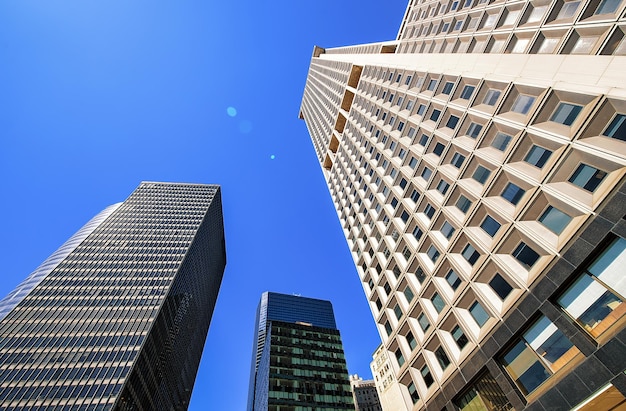 Bottom up view of glass skyscrapers in New York of USA