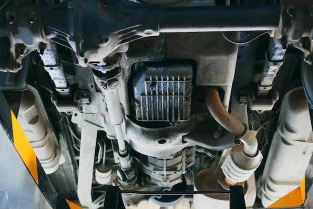 Bottom view of the car bottom Diagnostics and repair of a vehicle in an auto repair shop