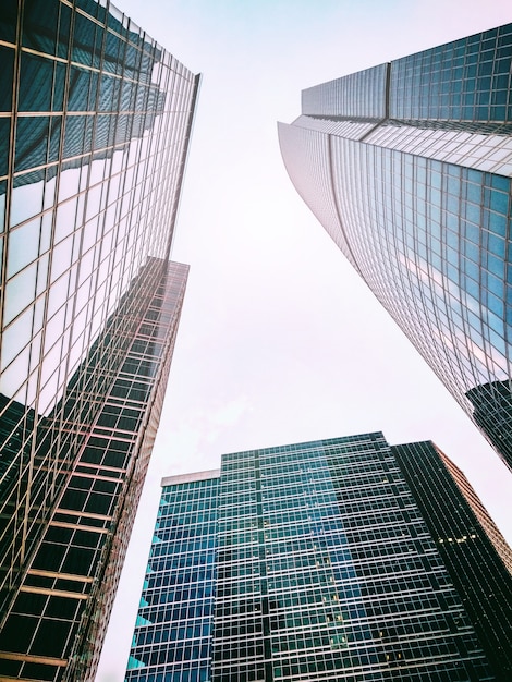 Bottom view of high skyscrapers. Triangular shape