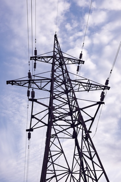 The bottom view of the large and powerful towering in the clouds