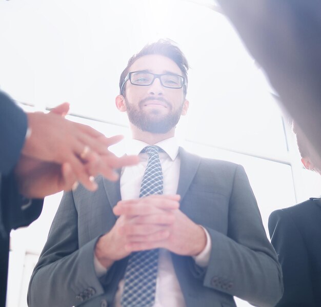 Bottom viewgroup of business people standing in the office business concept