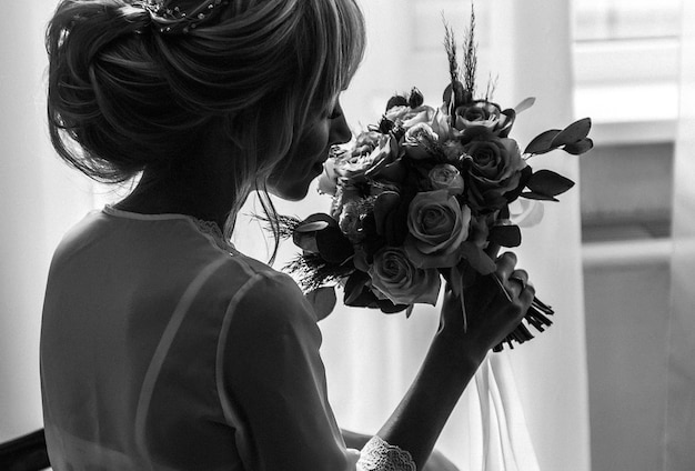 Boudoir of the bride. charming bride in the morning in a negligee prepares for the celebration