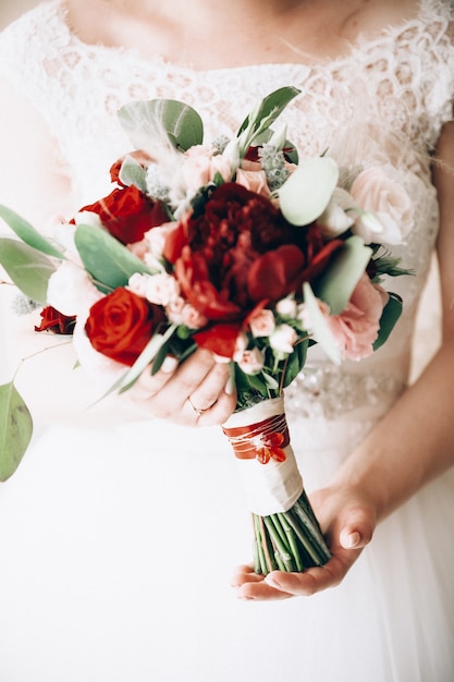 Boudoir of the bride. charming bride in the morning in a negligee prepares for the celebration