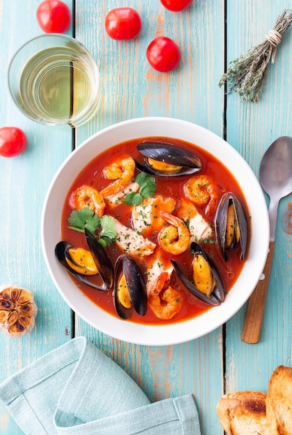 Bouillabaisse soup with fish mussels and shrimps French cuisine Seafood
