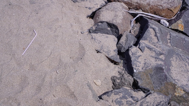 Masso sullo sfondo del grunge spiaggia