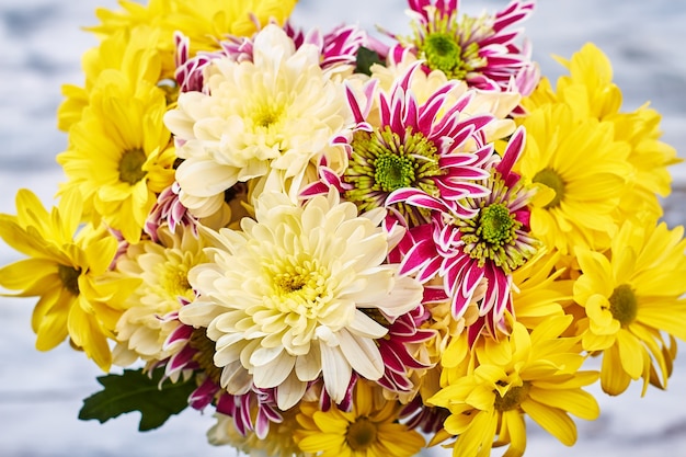 Bouquet of autumn chrysanthemums. Beautiful present for a woman.