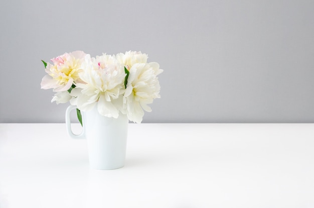 Bouquet of beautiful peonies on a clean background